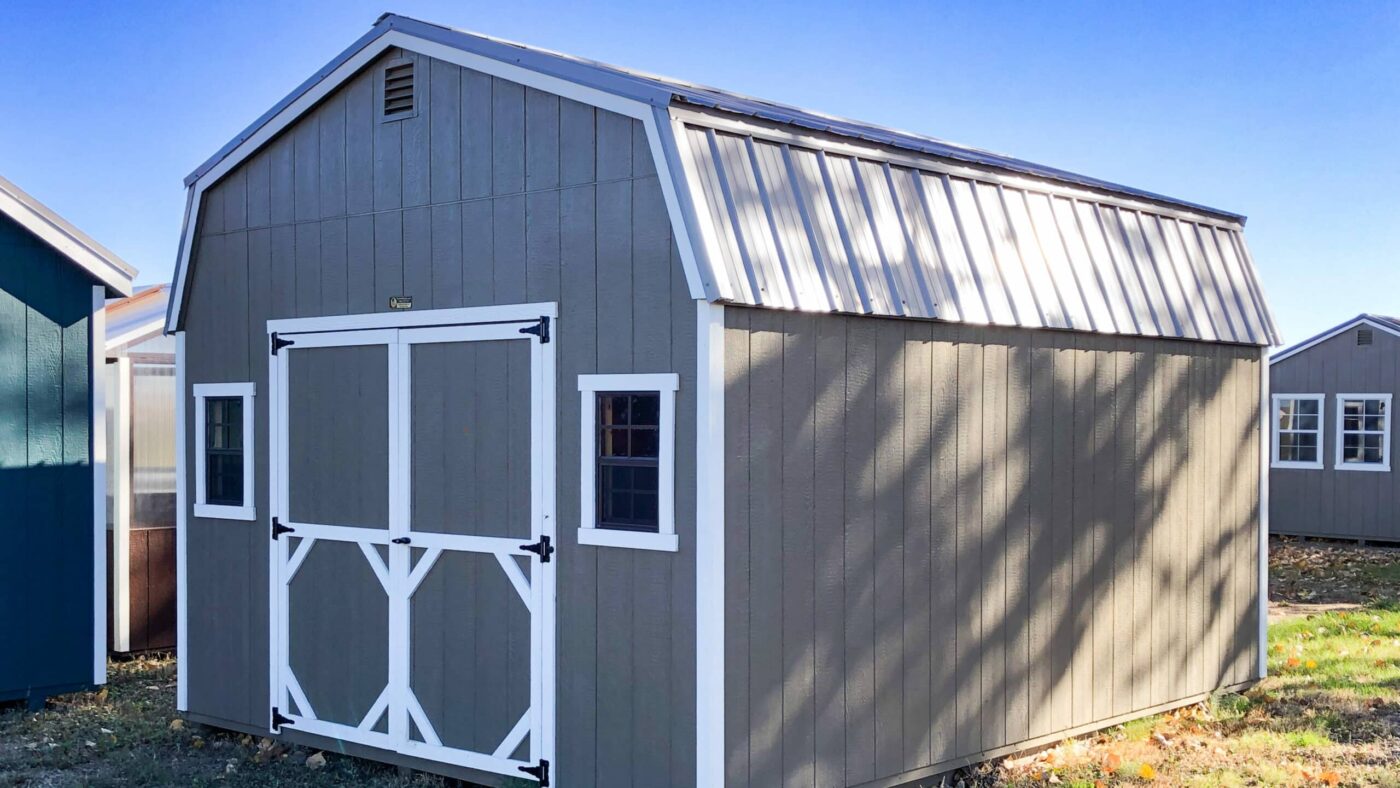 Gray 10x12 shed in shed lot