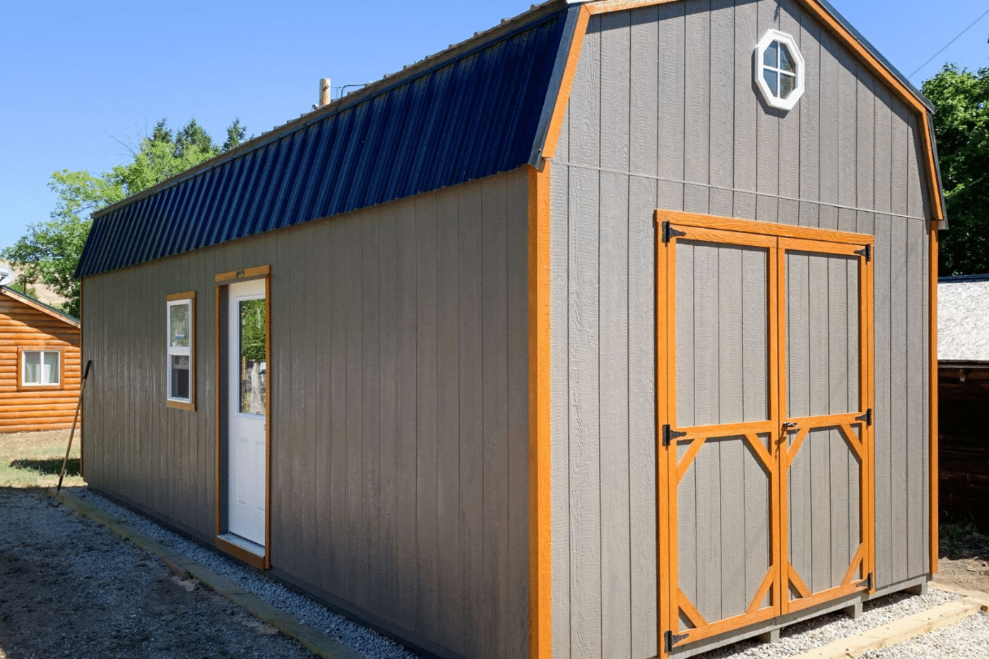 12x14 grey orange with blue roof hi side shed