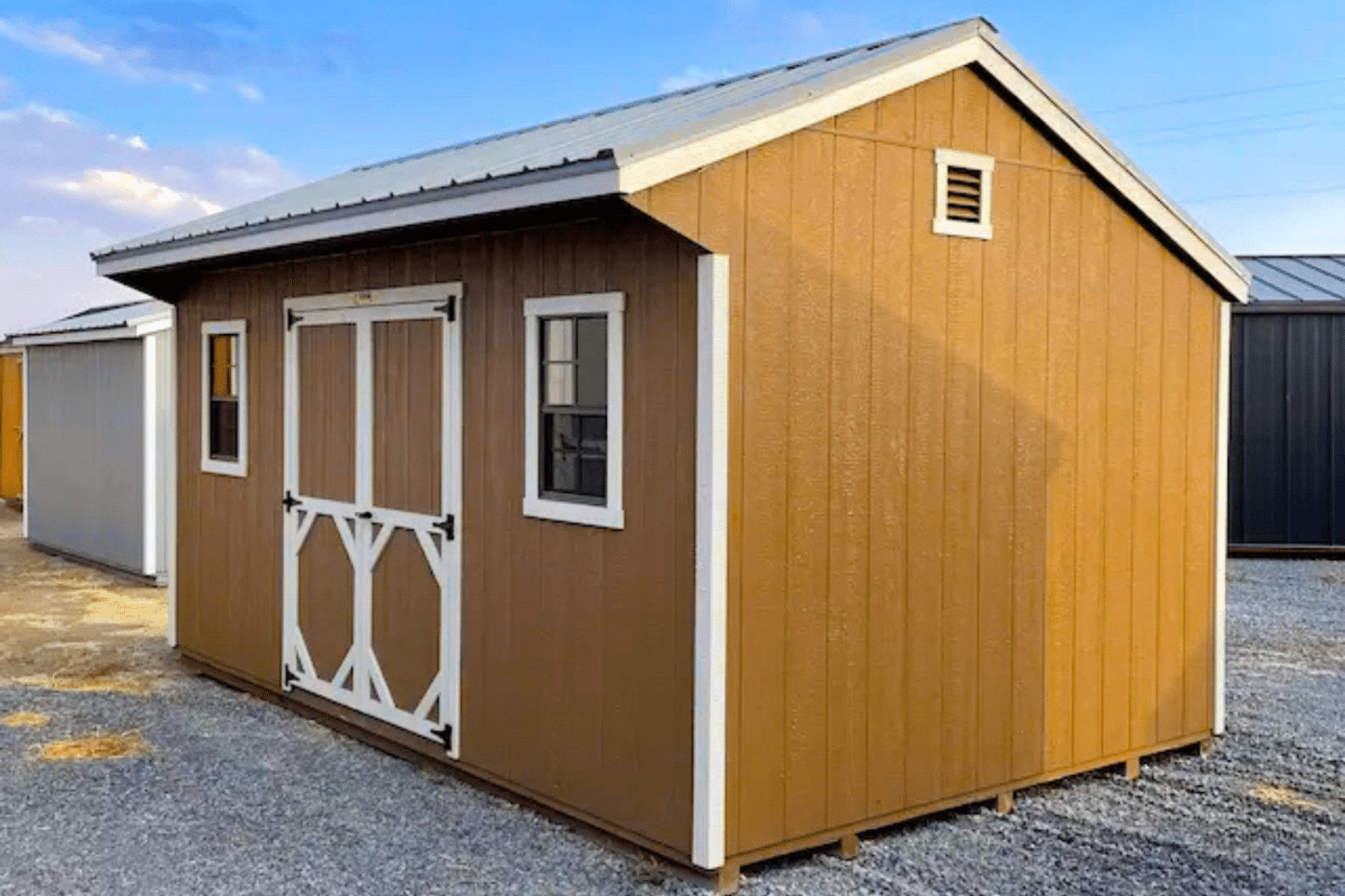 12x20 brown and white quaker shed