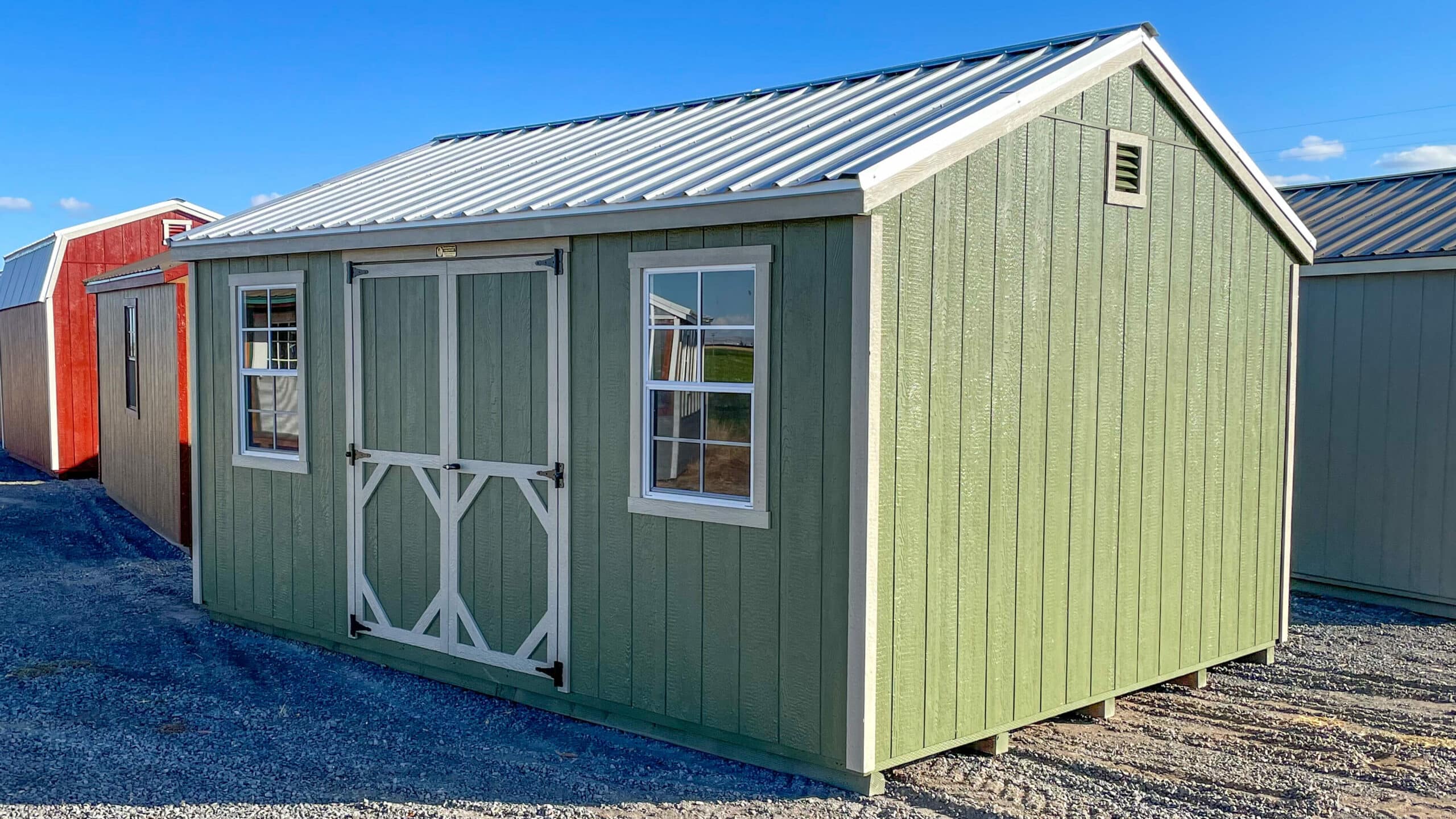 a frame storage shed with windows