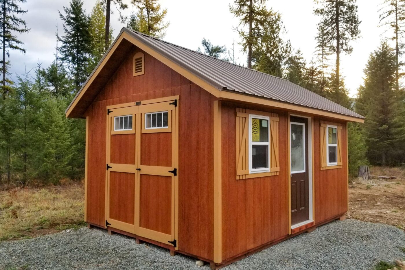 Red 10x12 shed in woods